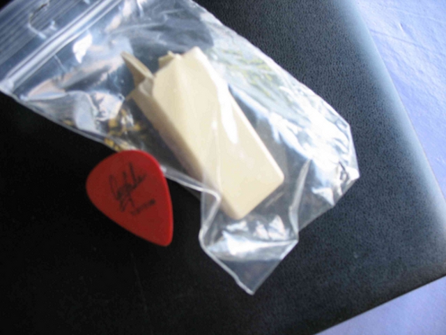 Original Key of Keith Emerson's Hammond organ, Model L 100 + Original Greg Lake Plectrum